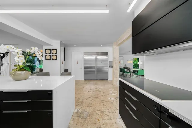 a view of a dining room with furniture and window