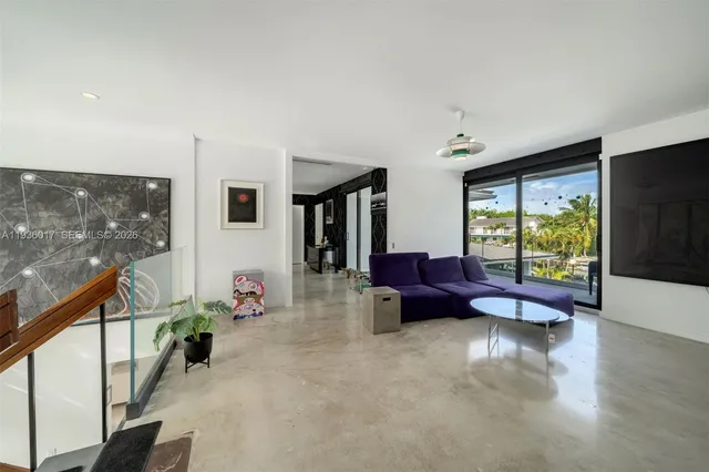 a front view of house with deck yard and outdoor seating