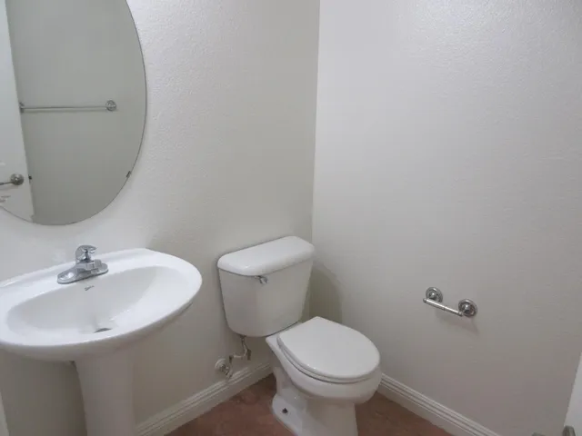 a bathroom with a sink and a toilet