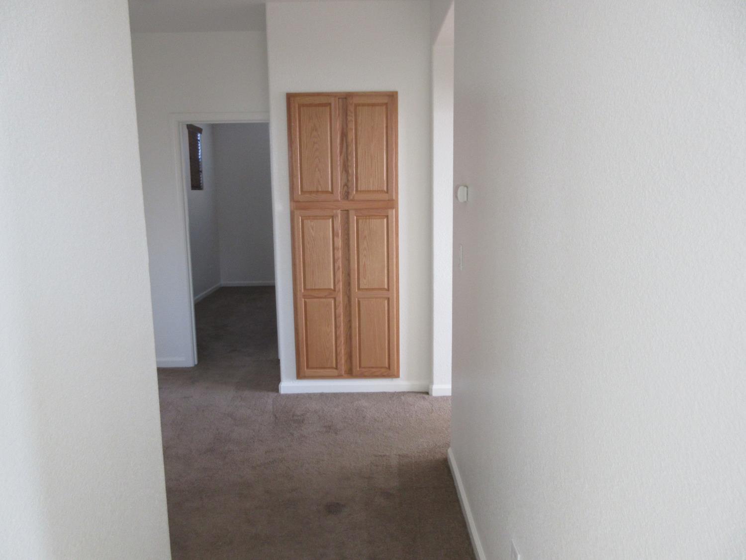 1016 Papaya Street Madera, CA 93638 - Photo 17 of 29 an empty room with windows