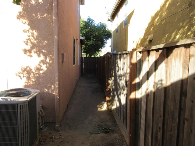 a view of balcony with a potted plant