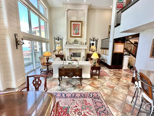 a building outdoor space with patio furniture and garden view