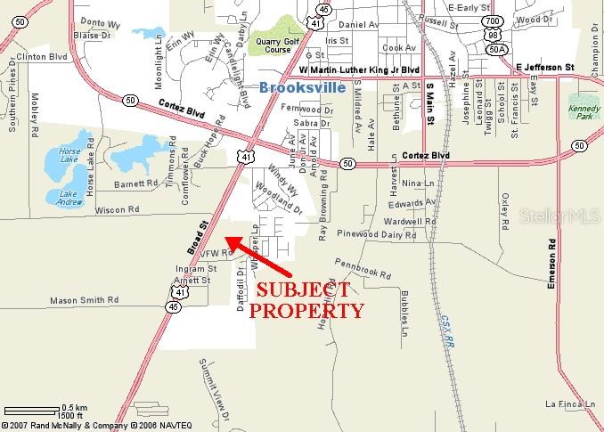 7154 Broad Street Brooksville, FL 34601 - Photo 6 of 8 a picture of a book and a bed