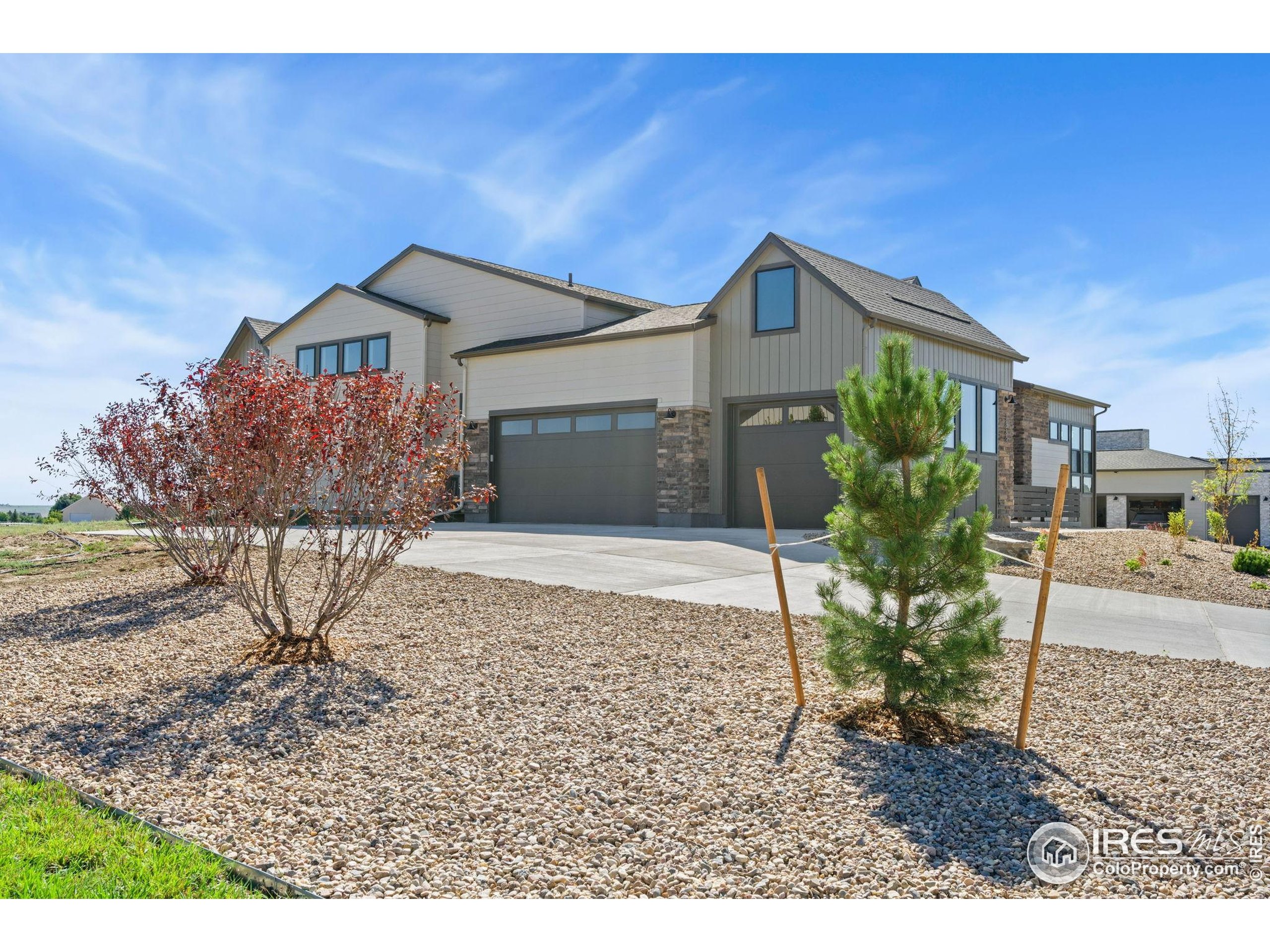 1889 Spring Bloom Drive Windsor, CO 80550 - Photo 21 of 32 a house view with a outdoor space
