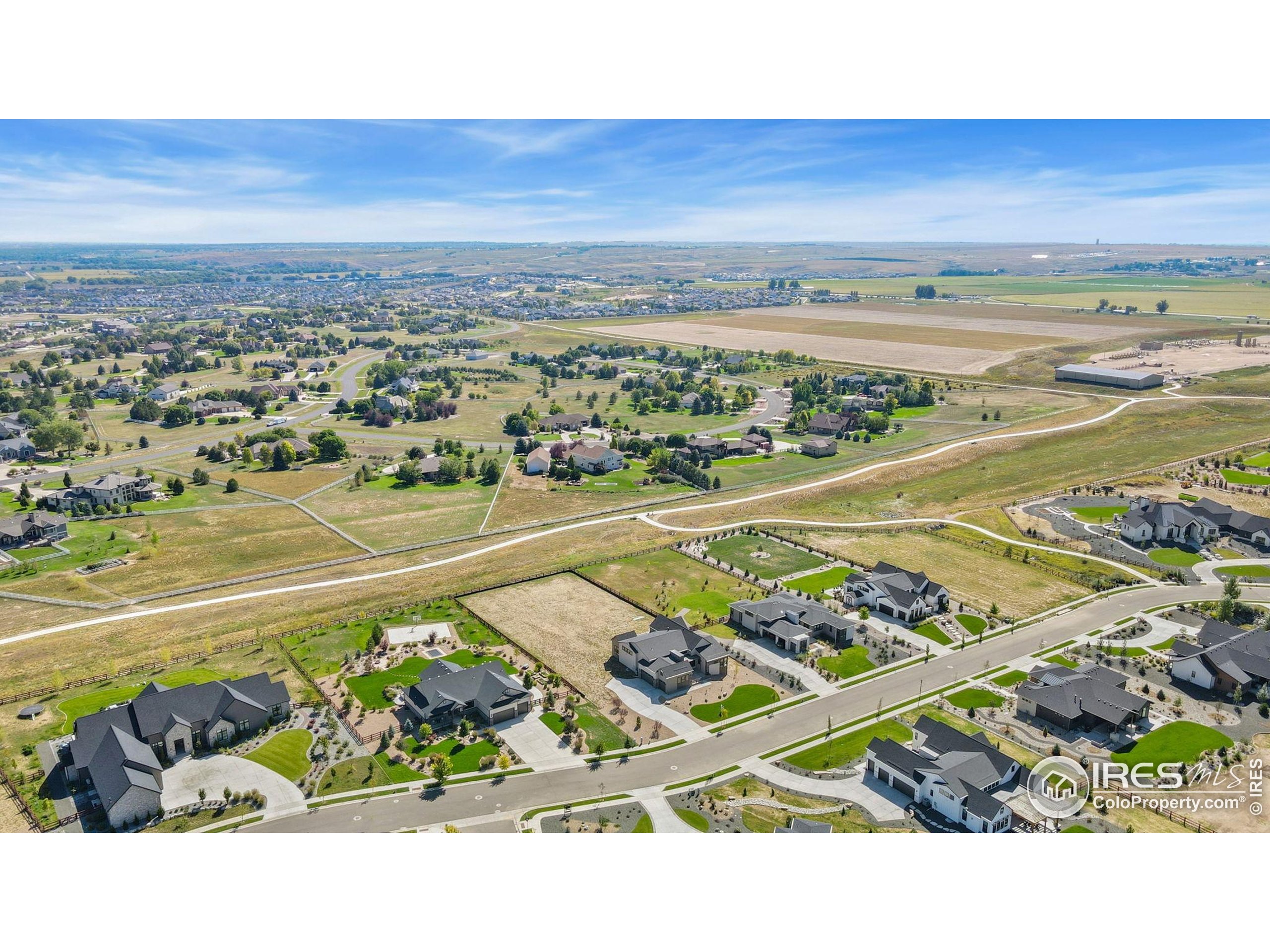 1889 Spring Bloom Drive Windsor, CO 80550 - Photo 22 of 32 a view of an ocean and beach