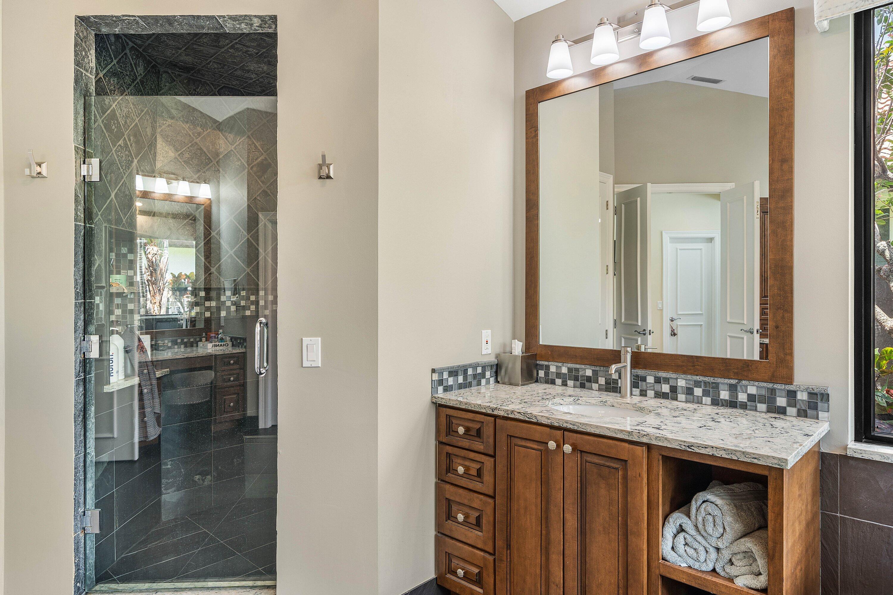 2357 Northwest 59th Street Boca Raton, FL 33496 - Photo 37 of 88 a bathroom with a granite countertop sink and a mirror