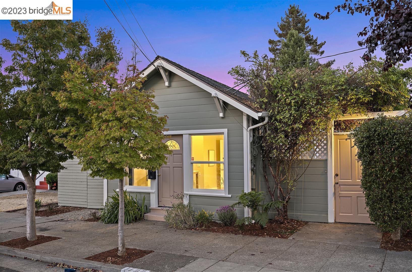 a house with trees in the background