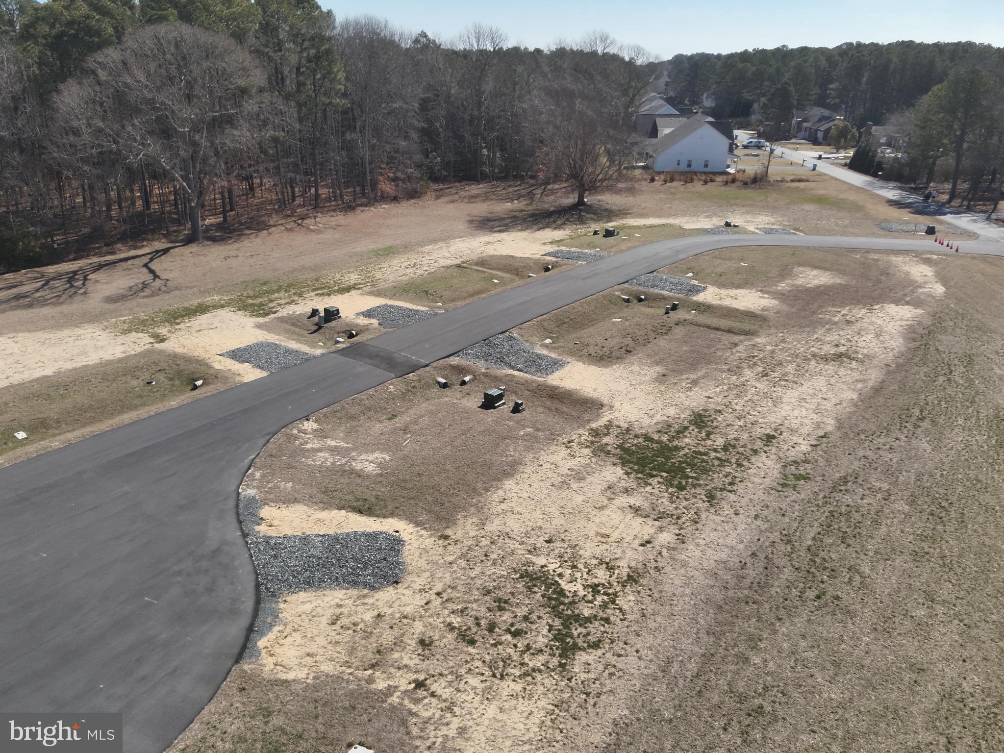 3 Stephen Decatur Highway Ocean City, MD 21842 - Photo 7 of 19 a view of a dry yard with trees