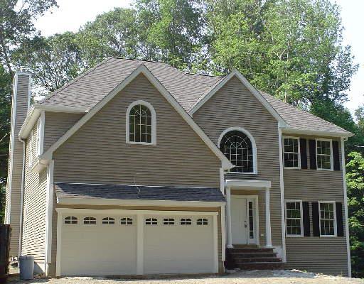 19 Macdonald Road Trumbull, CT 06611 - Photo 1 of 1 a view of a house with a yard and garage