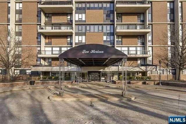 a front view of a building with street