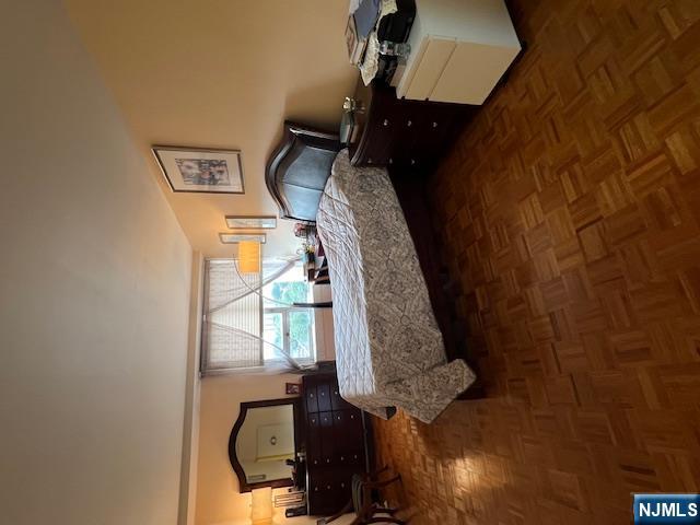 2 Horizon Road, Unit 1423 Fort Lee, NJ 07024 - Photo 17 of 30 a bedroom with a bed window and couch