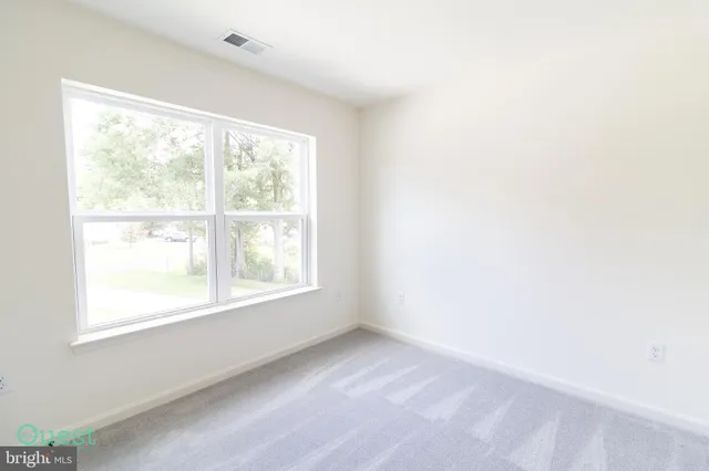 a view of a room with an empty space