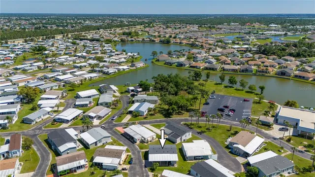 an aerial view of residential building with parking space