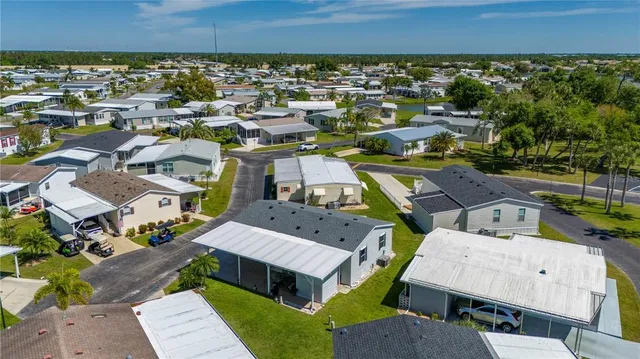 a sign on a street next to a road