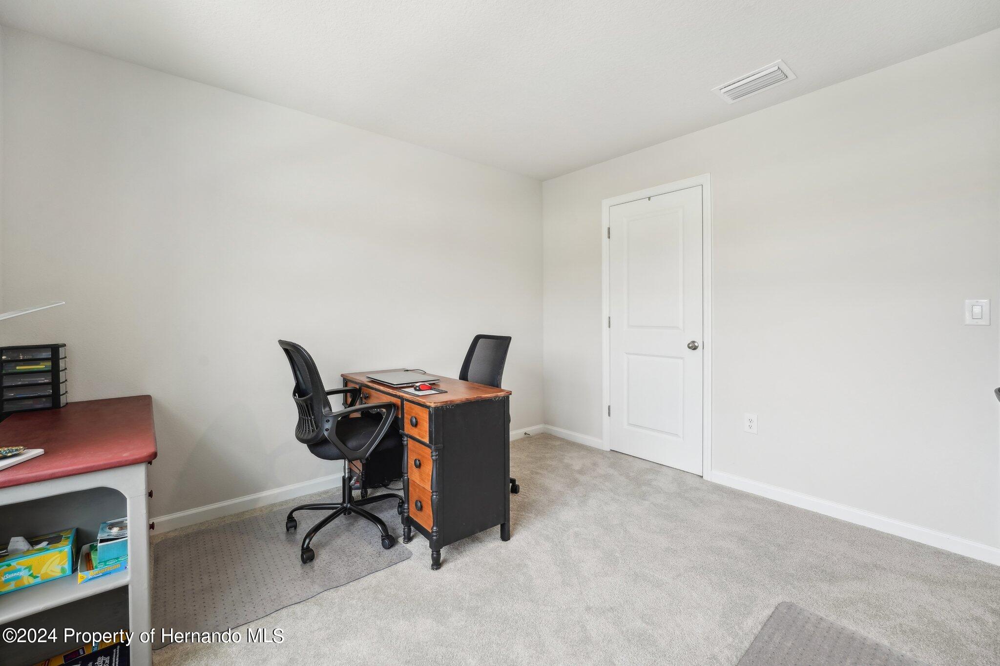12214 Grizzly Lane New Port Richey, FL 34654 - Photo 38 of 49 a view of workspace with windows