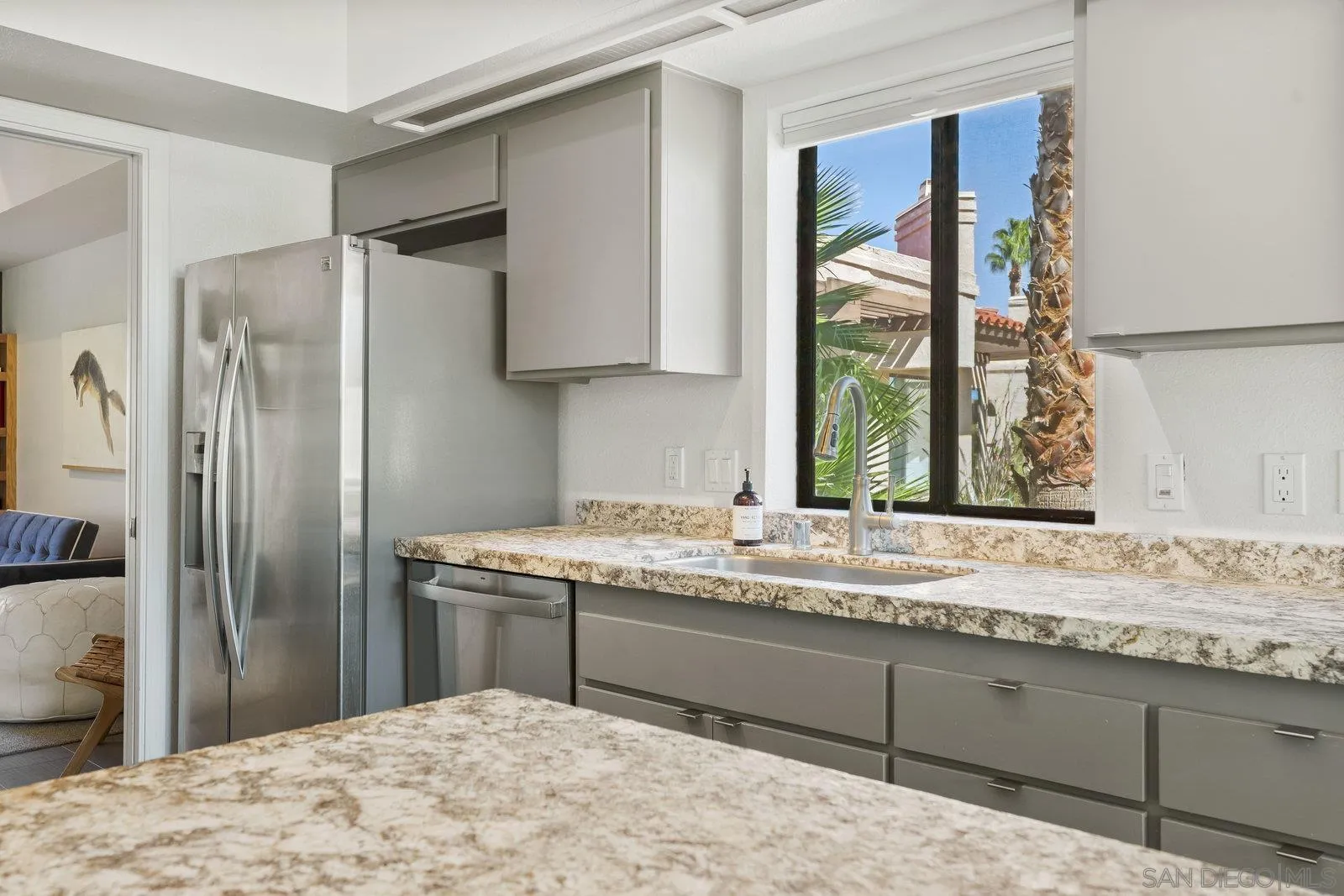 4604 Desert Vista Drive Borrego Springs, CA 92004 - Photo 11 of 41 a kitchen with stainless steel appliances granite countertop a sink and a refrigerator