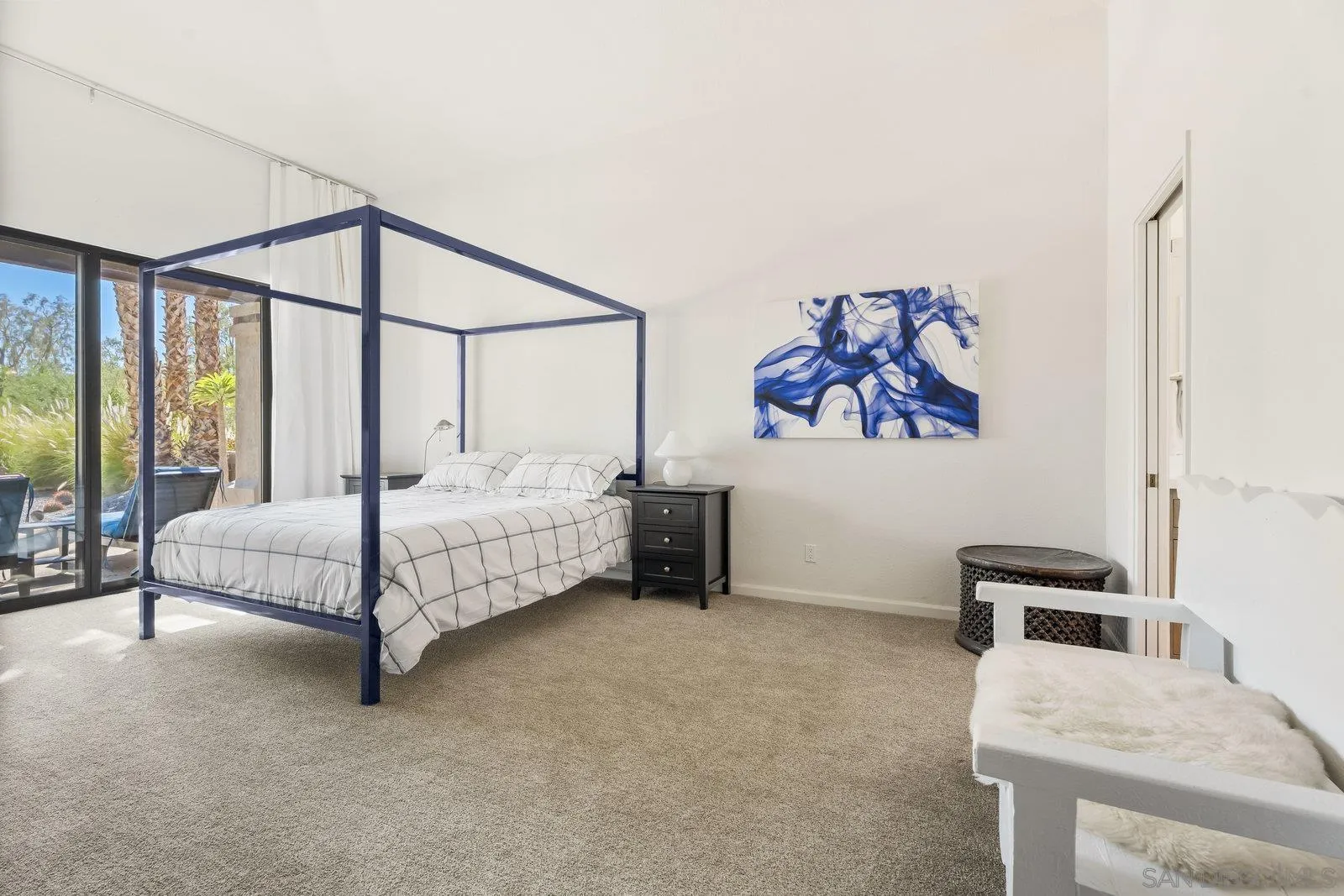 4604 Desert Vista Drive Borrego Springs, CA 92004 - Photo 15 of 41 a bedroom with a bed and a chandelier