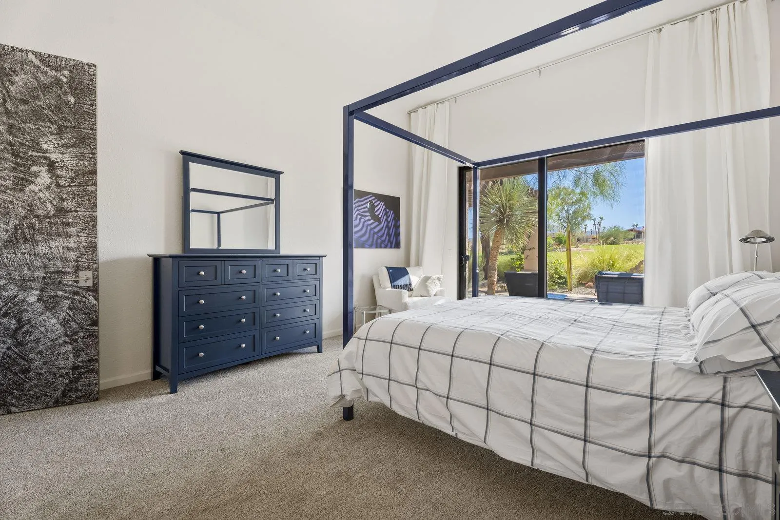 4604 Desert Vista Drive Borrego Springs, CA 92004 - Photo 16 of 41 a bedroom with a bed and a dresser