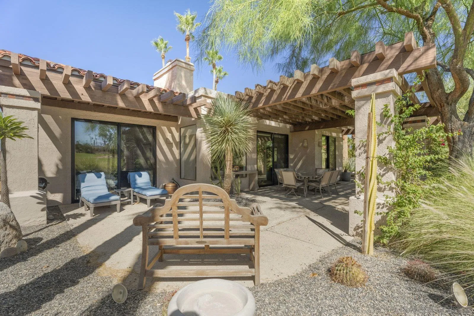 4604 Desert Vista Drive Borrego Springs, CA 92004 - Photo 28 of 41 a view of a building with a bench in porch