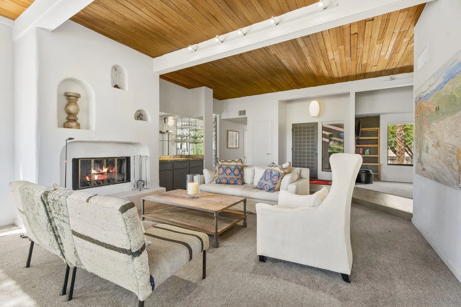 4604 Desert Vista Drive Borrego Springs, CA 92004 - Photo 3 of 41 a living room with furniture a fireplace and a table