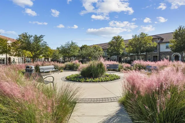 a view of a lake with a house in the background