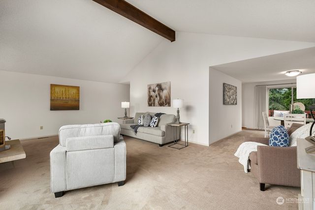 a living room with furniture and a couch