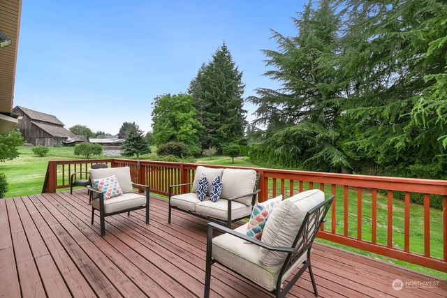 a view of roof deck with patio