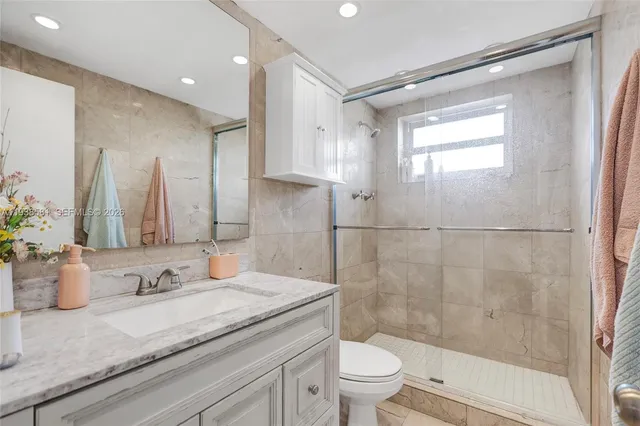 a view of a balcony with wooden floor