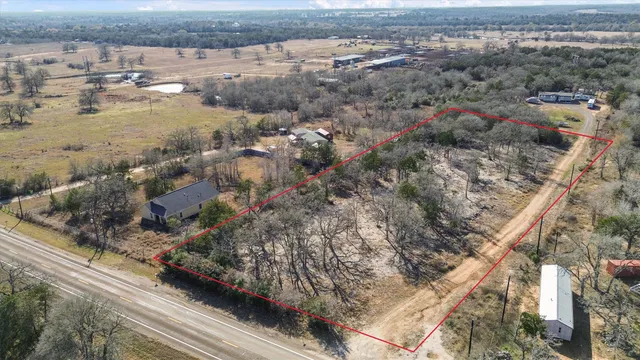 a view of a city street from a lake view