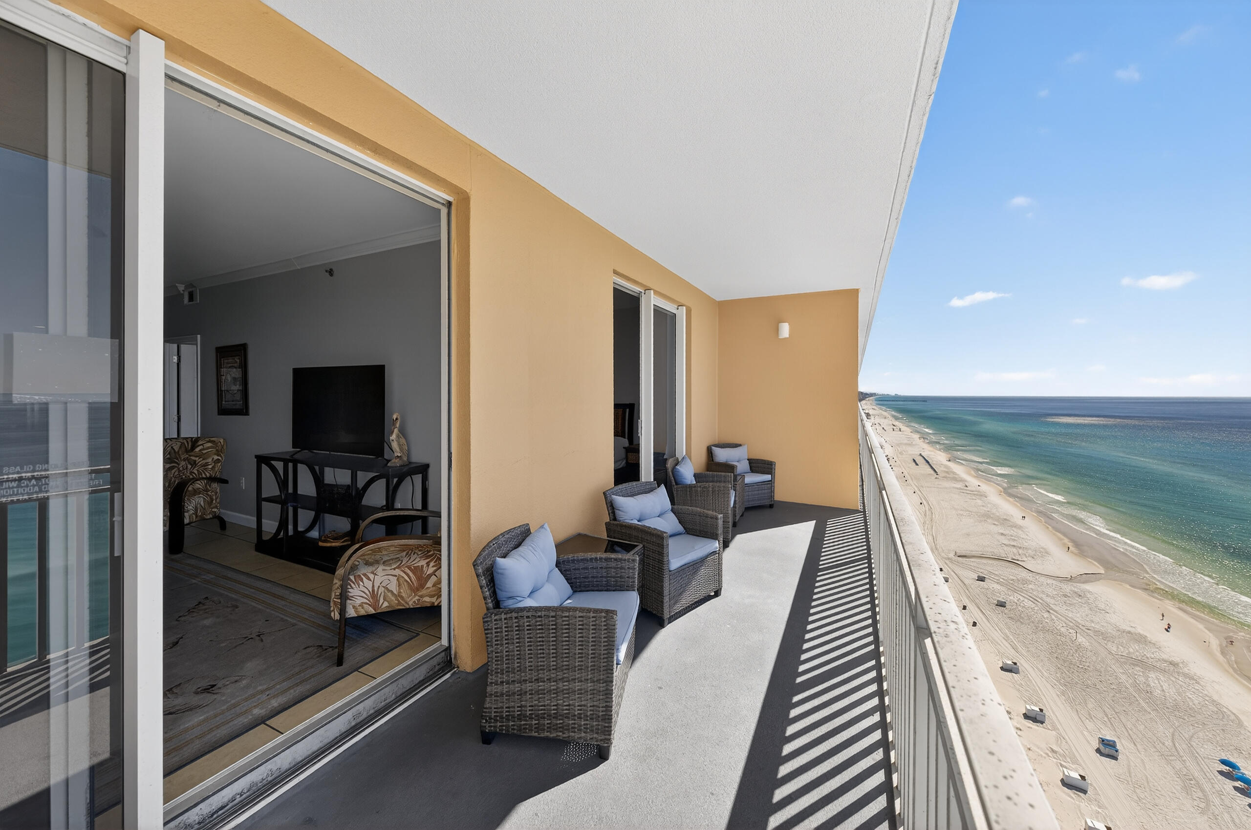 17739 Front Beach Road, Unit 1703W Panama City Beach, FL 32413 - Photo 11 of 50 a view of a living room and dining room