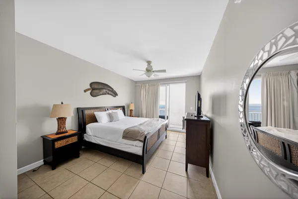 a bed room with a bed and a couch