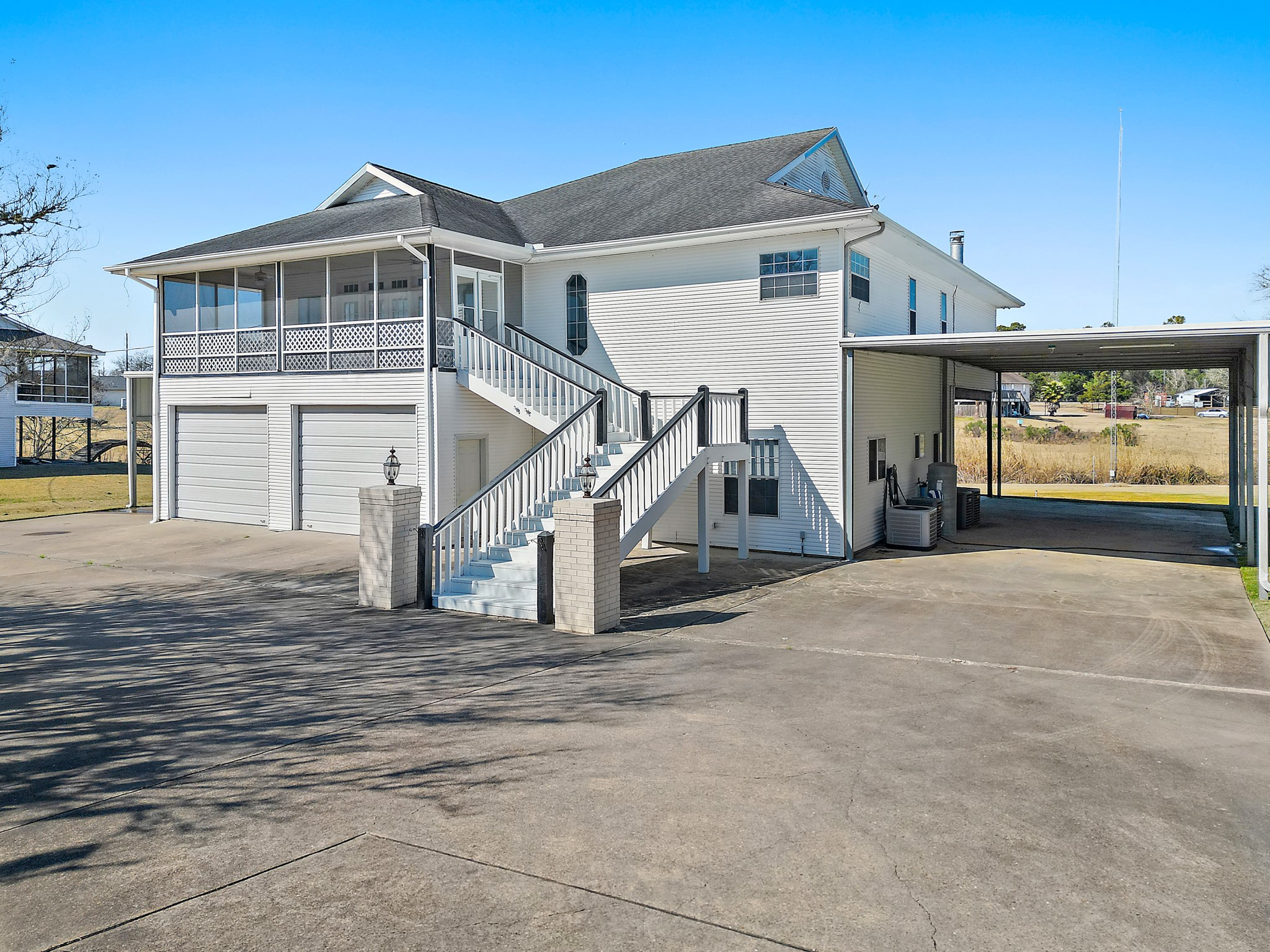 1306 Spring Branch Drive Baytown, TX 77523 - Photo 1 of 38 a front view of a house with a yard