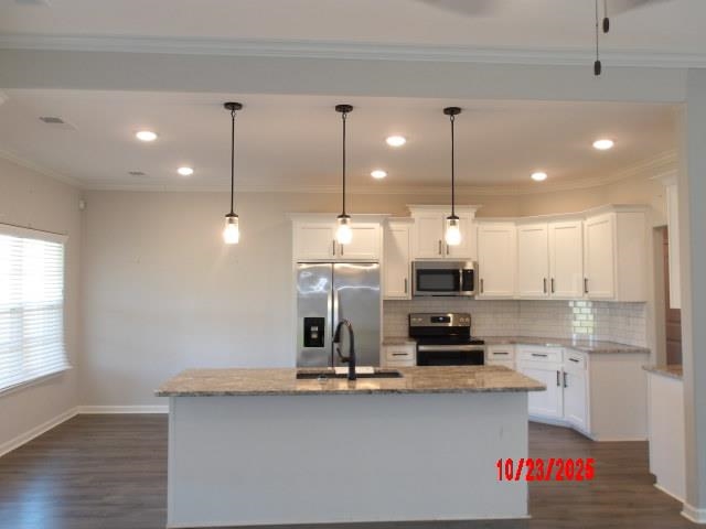 25 Daisy Way Somerville, TN 38068 - Photo 13 of 23 a kitchen with kitchen island a stove and a wooden floor