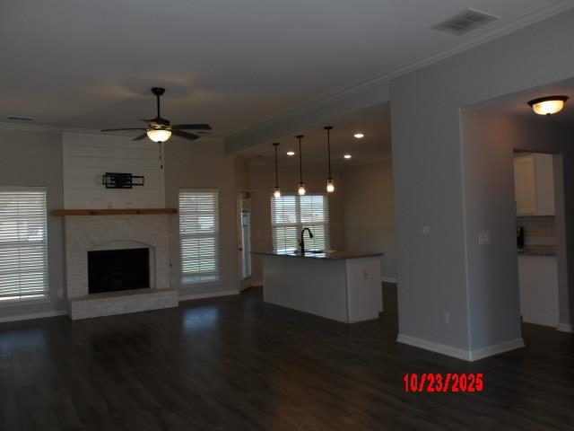 25 Daisy Way Somerville, TN 38068 - Photo 19 of 23 a view of a livingroom with a fireplace a window and wooden floor