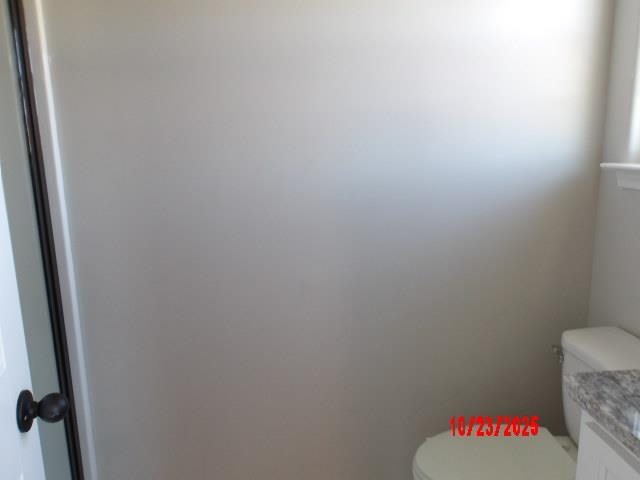 25 Daisy Way Somerville, TN 38068 - Photo 21 of 23 a bathroom with a toilet