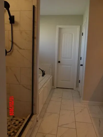 a bathroom with a bathtub