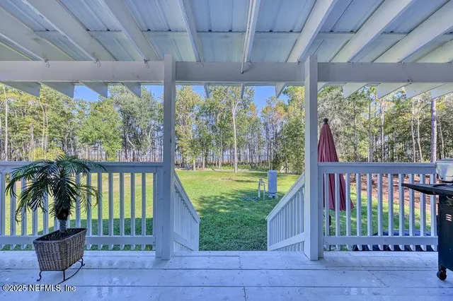 a view of a porch in front of a house