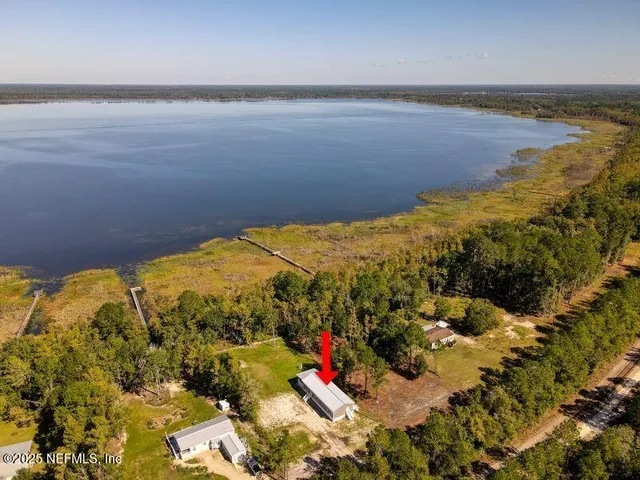 a view of an ocean and a mountain