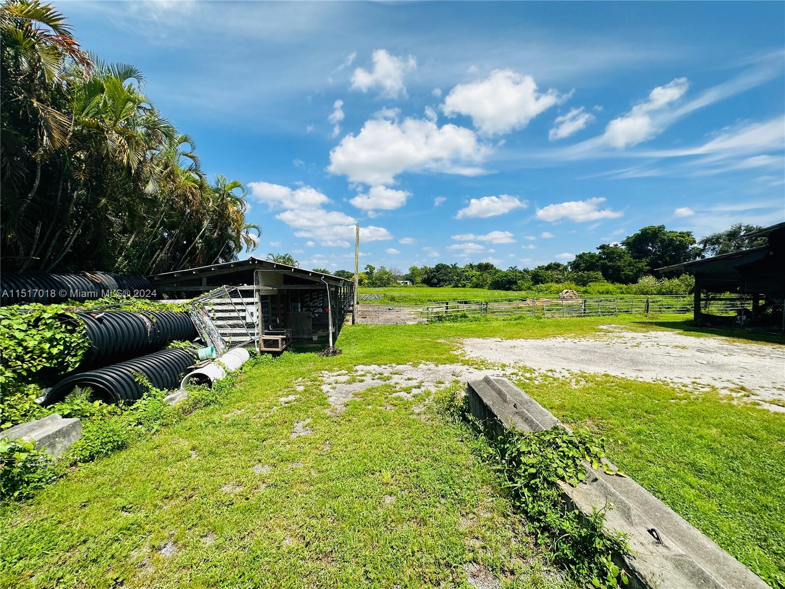 5901 Southwest 160th Avenue Southwest Ranches, FL 33331 - Photo 84 of 92 a view of a house with a big yard