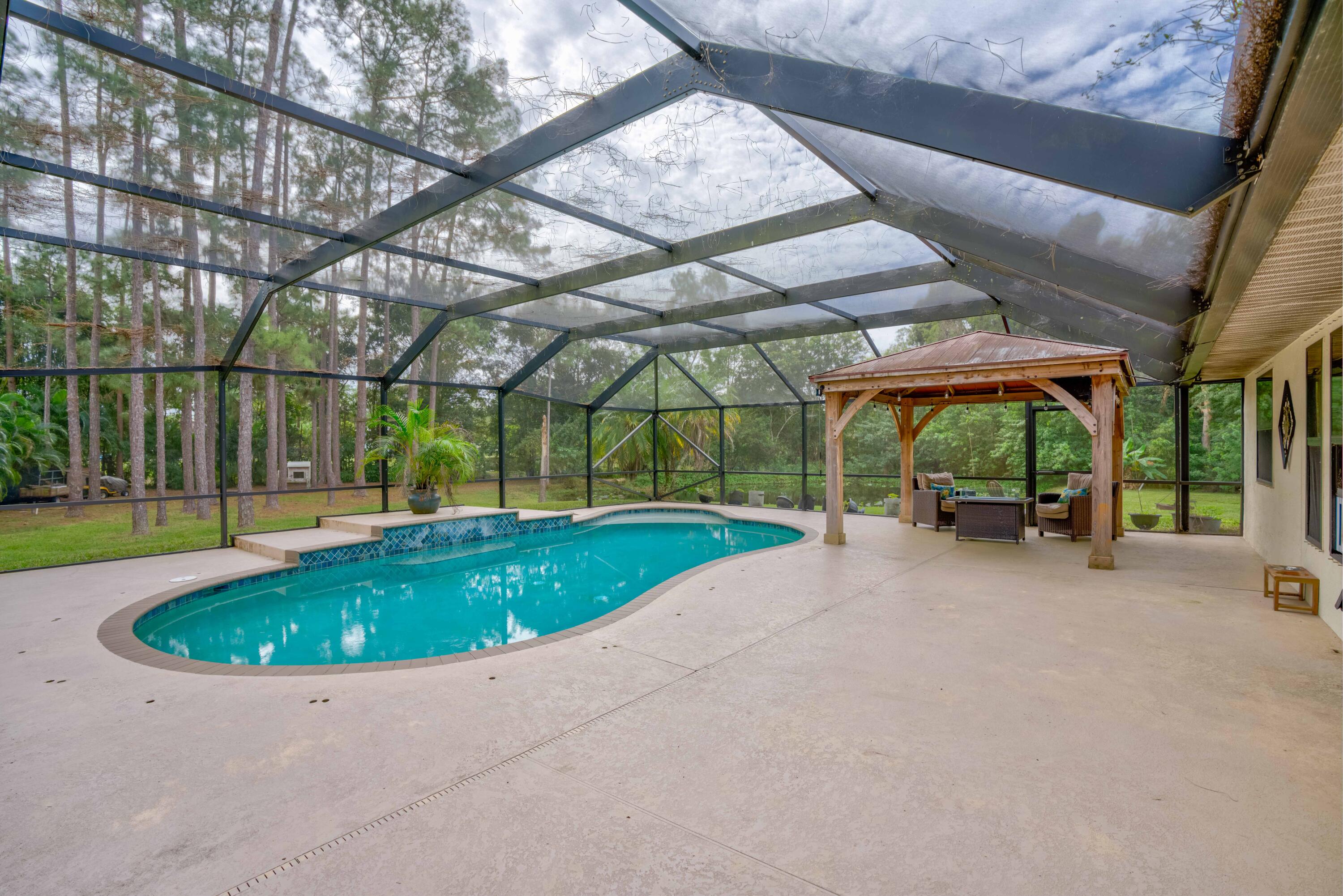 12448 154th Road North Jupiter, FL 33478 - Photo 26 of 66 Pool/Cabana