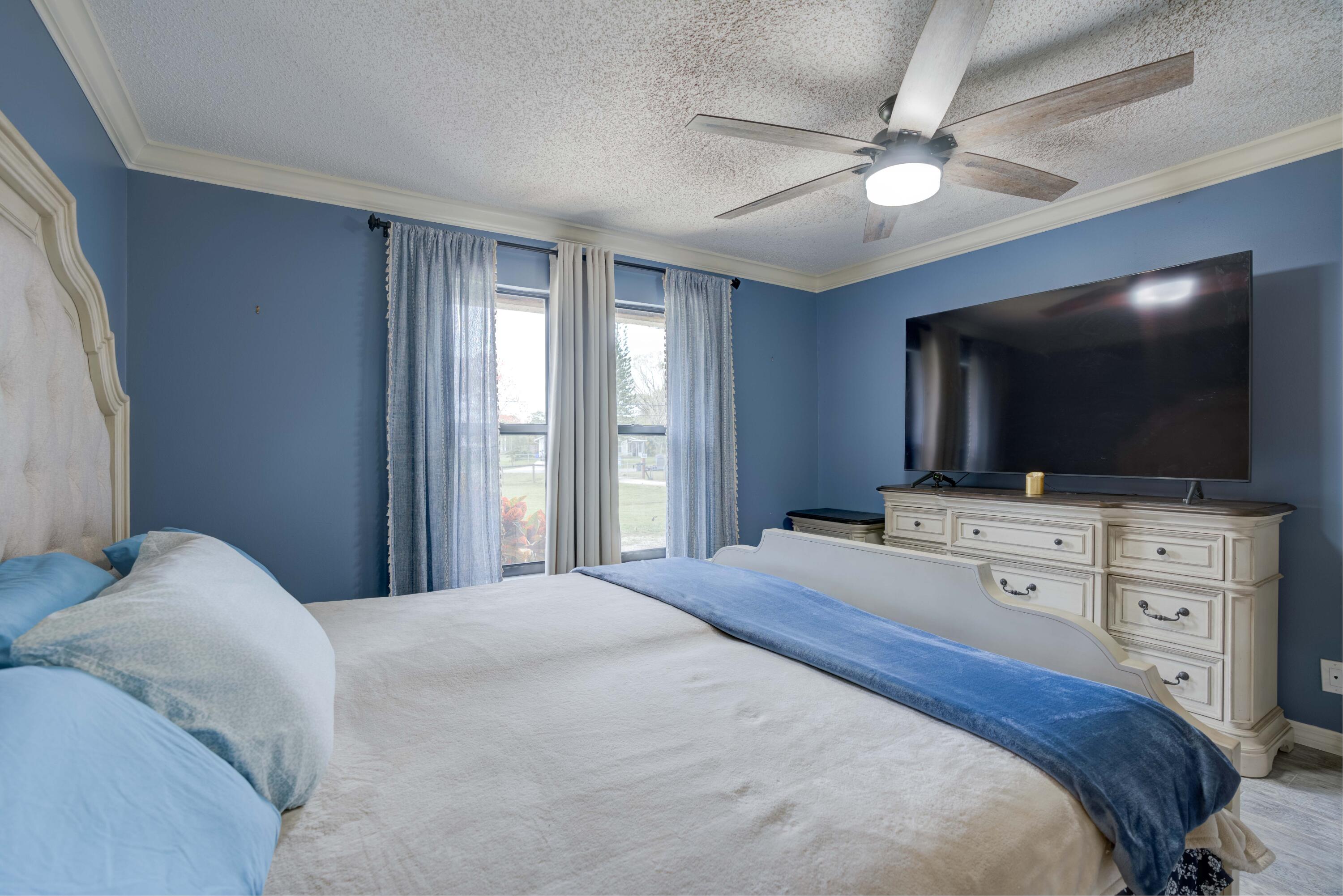12448 154th Road North Jupiter, FL 33478 - Photo 42 of 66 Primary Bedroom