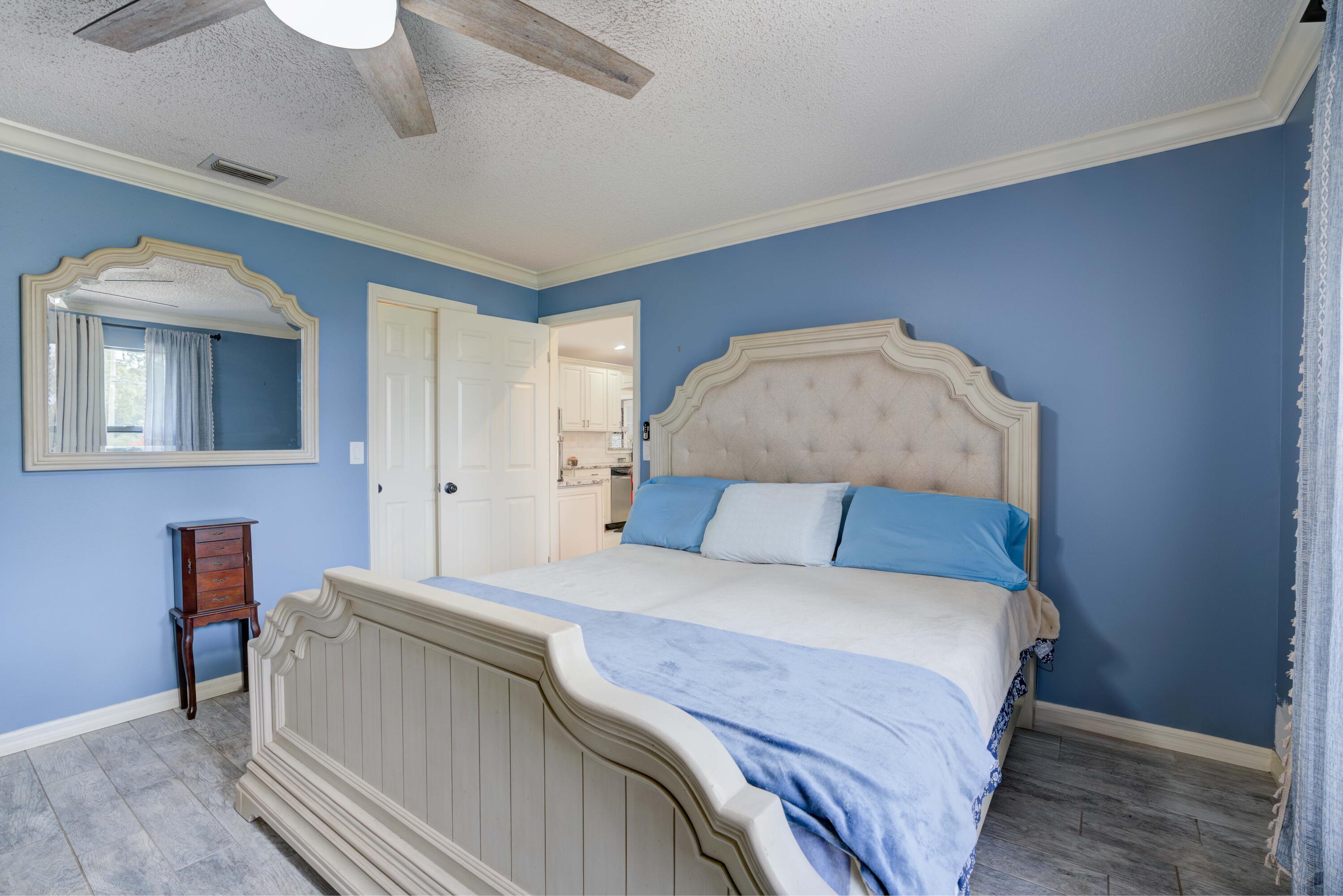 12448 154th Road North Jupiter, FL 33478 - Photo 44 of 66 Primary Bedroom