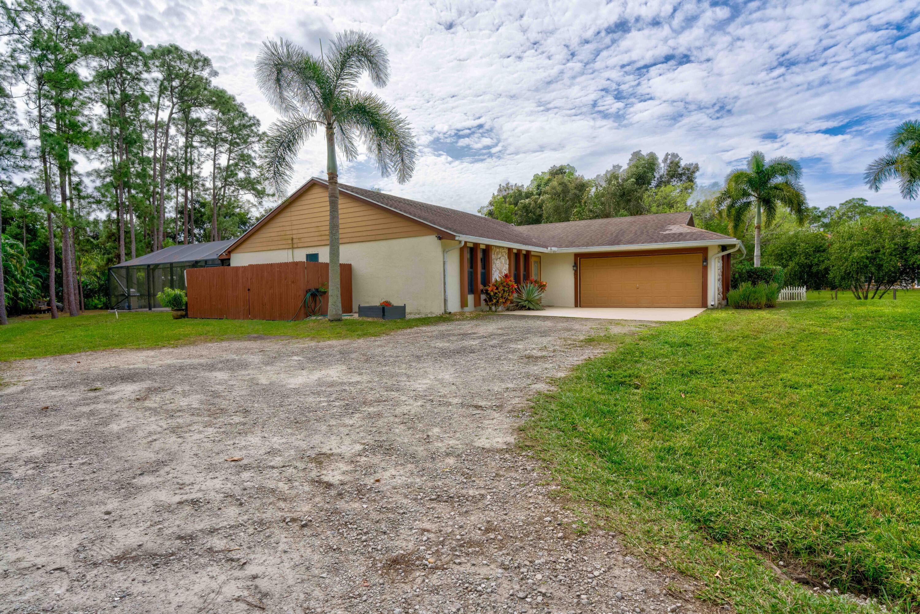 12448 154th Road North Jupiter, FL 33478 - Photo 65 of 66 Front/Side Exterior