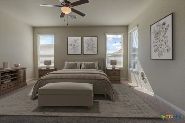 a bedroom with a bed and window