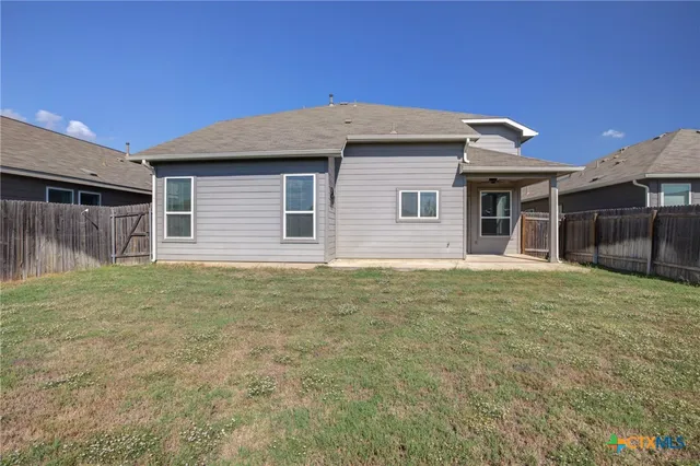 a front view of house with yard