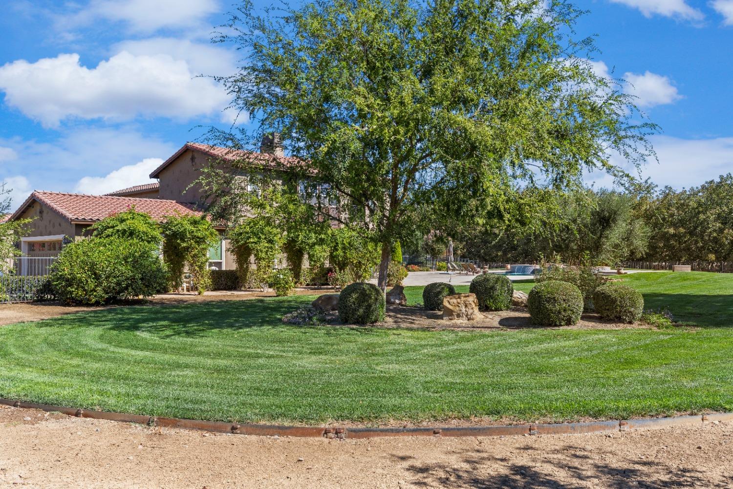 618 Elfers Road Patterson, CA 95363 - Photo 19 of 79 a view of a park with large trees