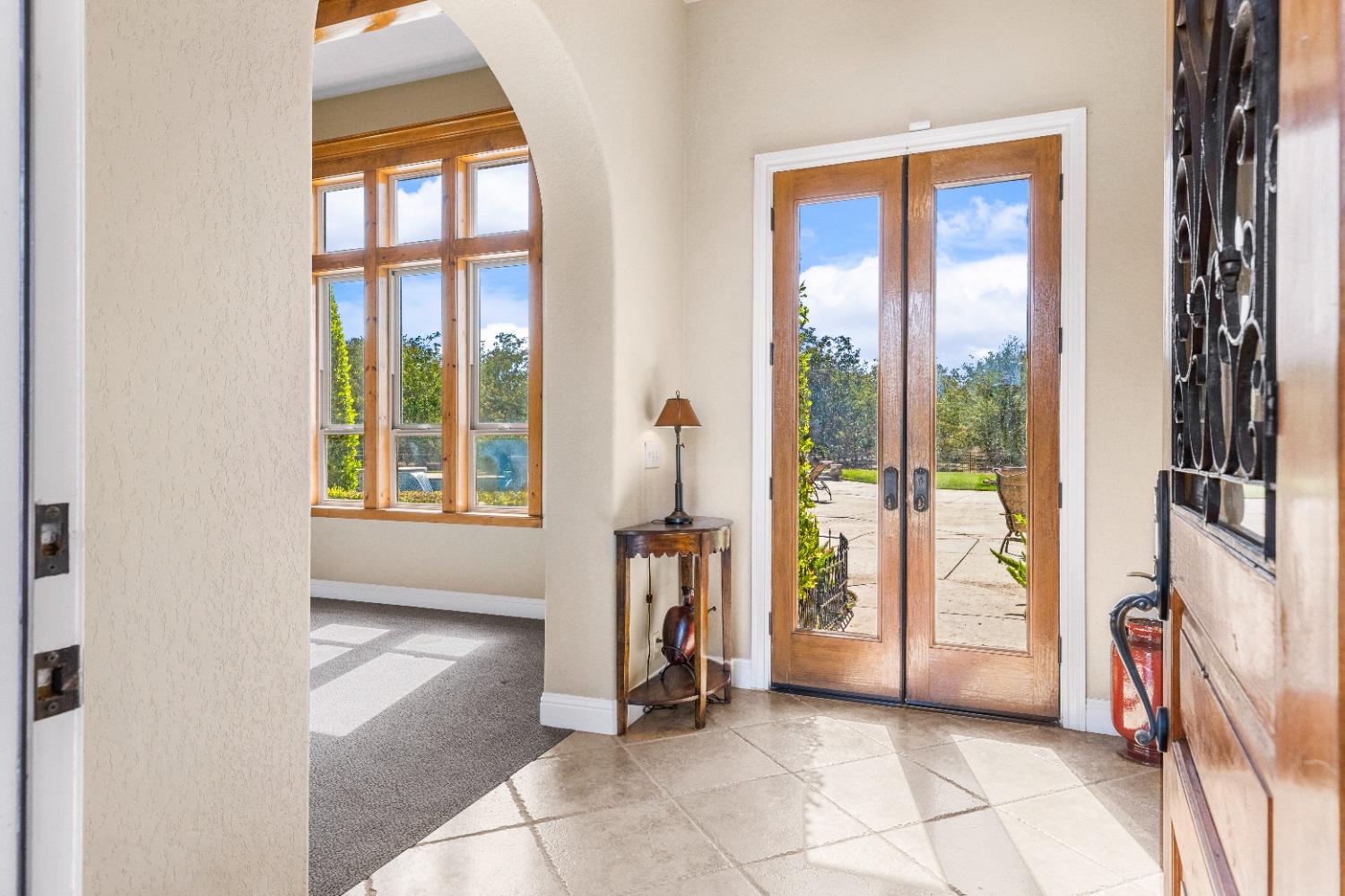 618 Elfers Road Patterson, CA 95363 - Photo 28 of 79 a view of an entryway with a floor to ceiling window