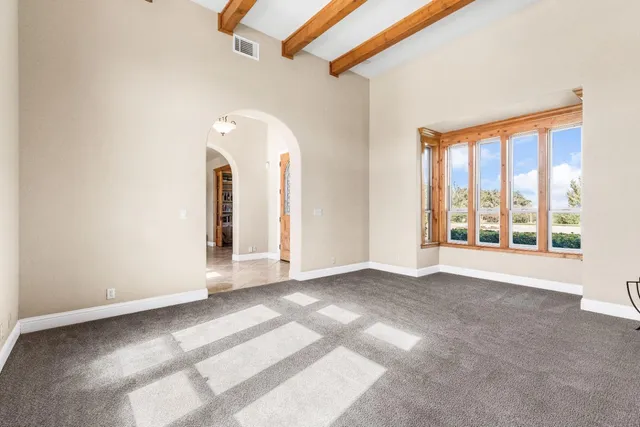 a bedroom with a bed and a fireplace