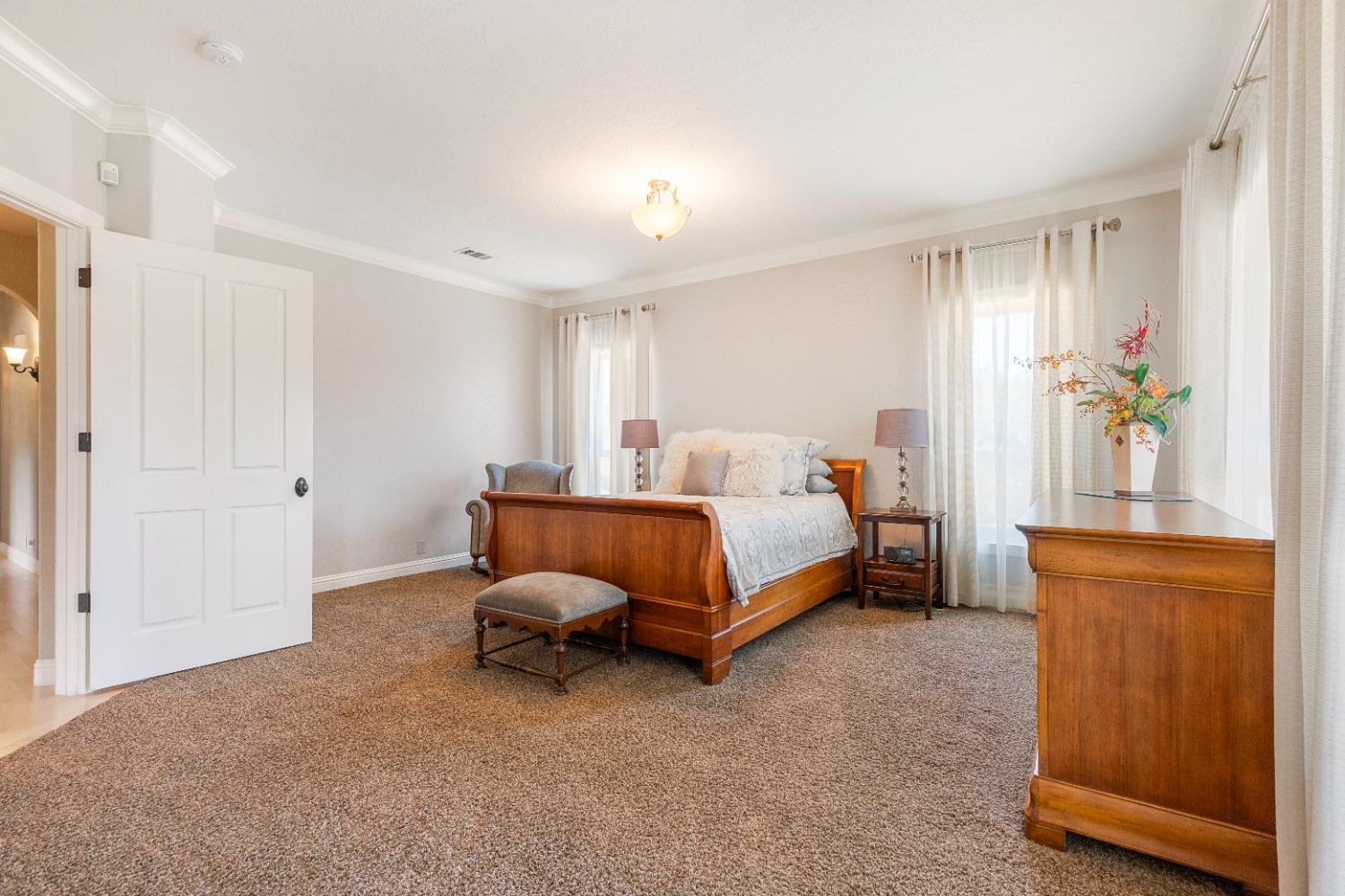 618 Elfers Road Patterson, CA 95363 - Photo 55 of 79 a bedroom with a bed and a dresser