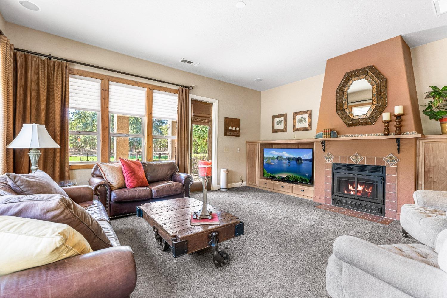 618 Elfers Road Patterson, CA 95363 - Photo 57 of 79 a living room with furniture and a fireplace
